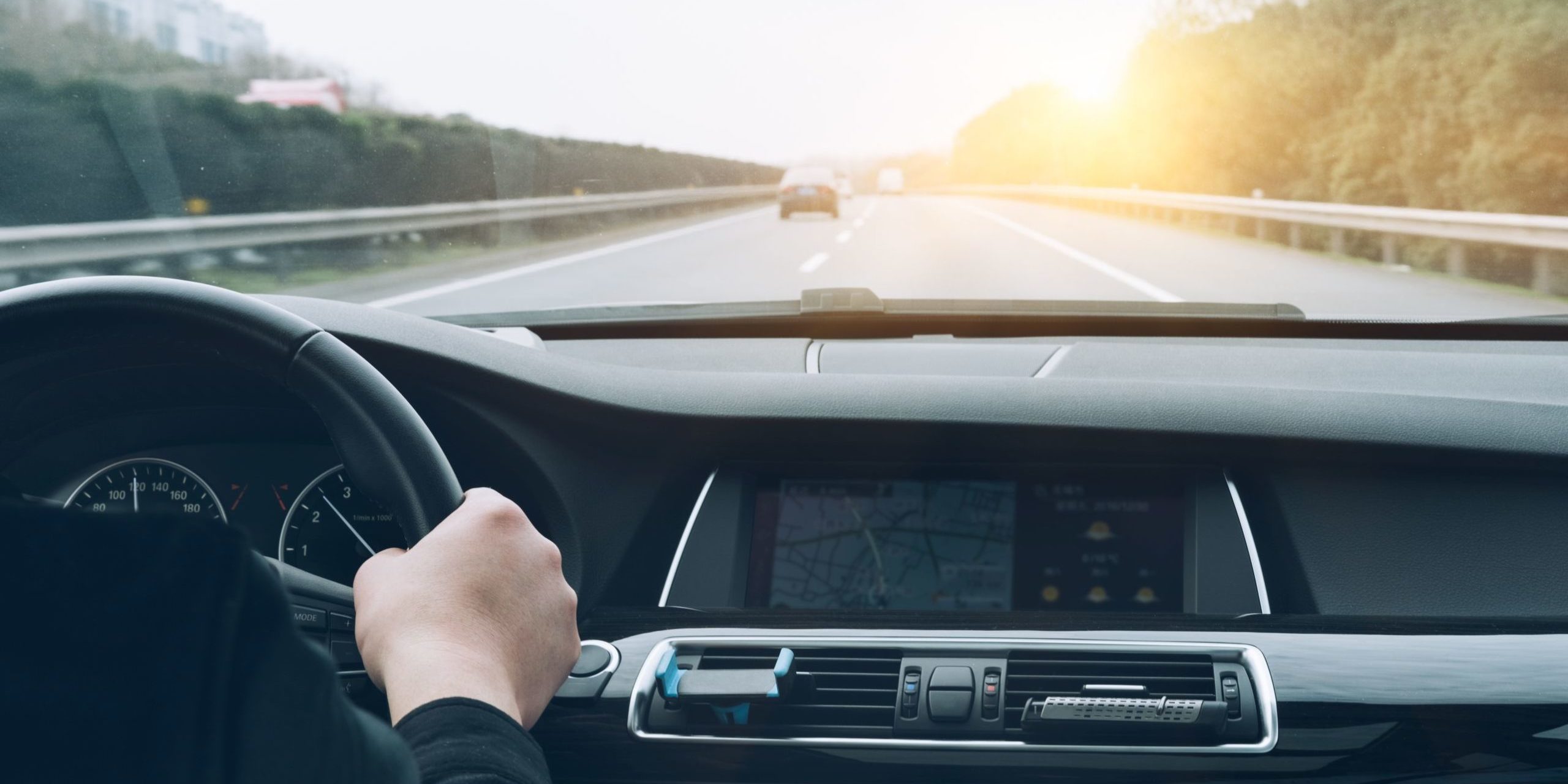 man driving car from rear view